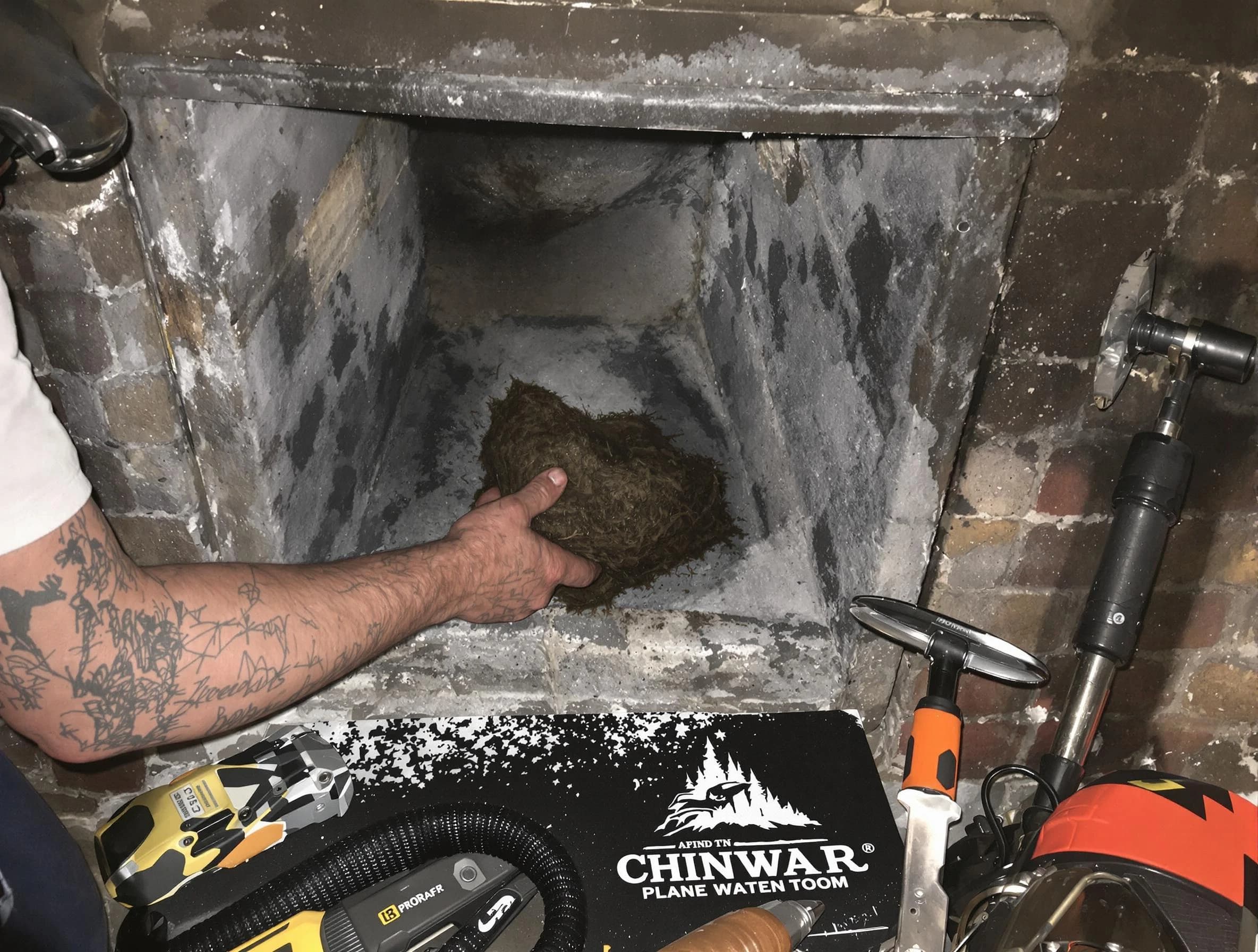 Plum Chimney Sweep safely removing debris and screening chimney in Plum, PA